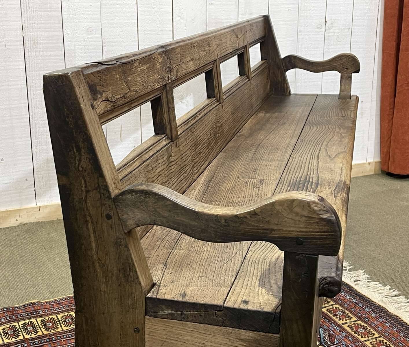 Rustic chestnut bench from the late 19th century.
