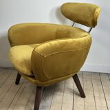 Mustard yellow velvet armchair from the 2010s.