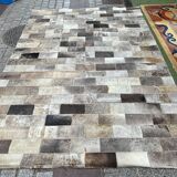Leather carpets with rectangular geometric patterns