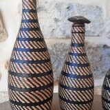 Wicker and leather bottle