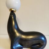 Lampe otarie noire irisée bleue en terre cuite