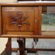 Solid walnut sideboard, moustache legs, black marble top.