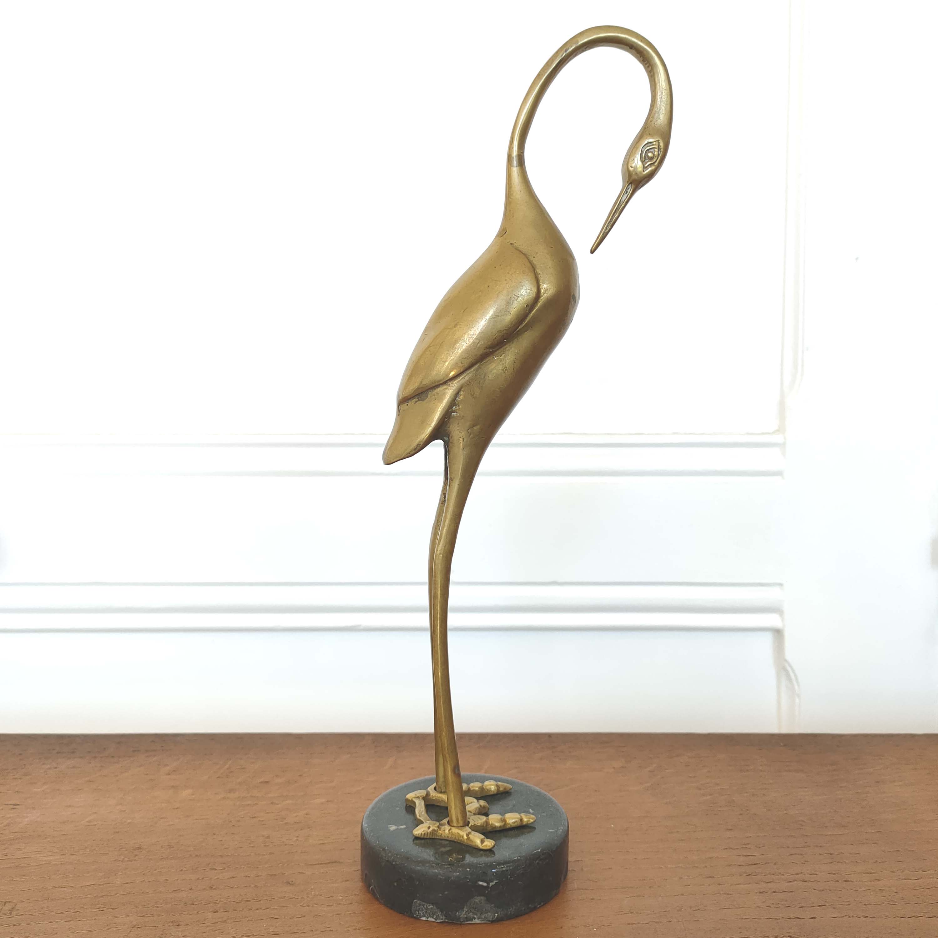 Brass heron