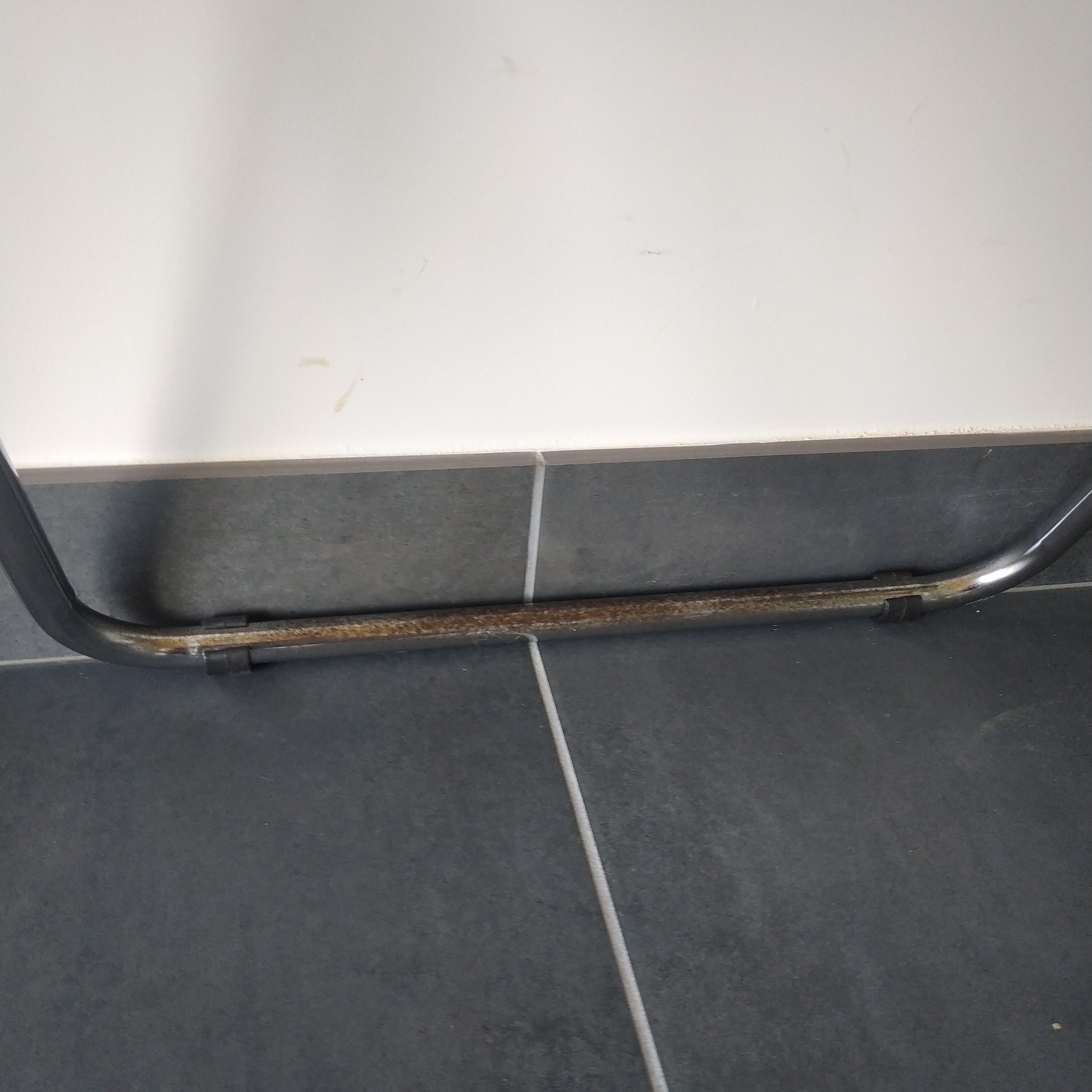 Seventies stainless steel and caramel chairs