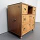 Antique campaign chest / ship’s chest, England, 1940s. Mahogany with a distinctive grain, brass inlays and hardware.