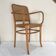 Fauteuil en bois courbé et cannage