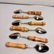 Set of 6 vintage dessert spoons with bamboo handles.