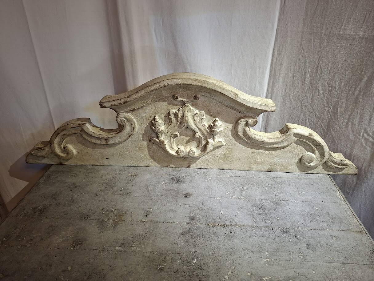 Antique wooden furniture pediment, pale green patina