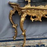Mirror set with baroque style gilded wood console on marble top.