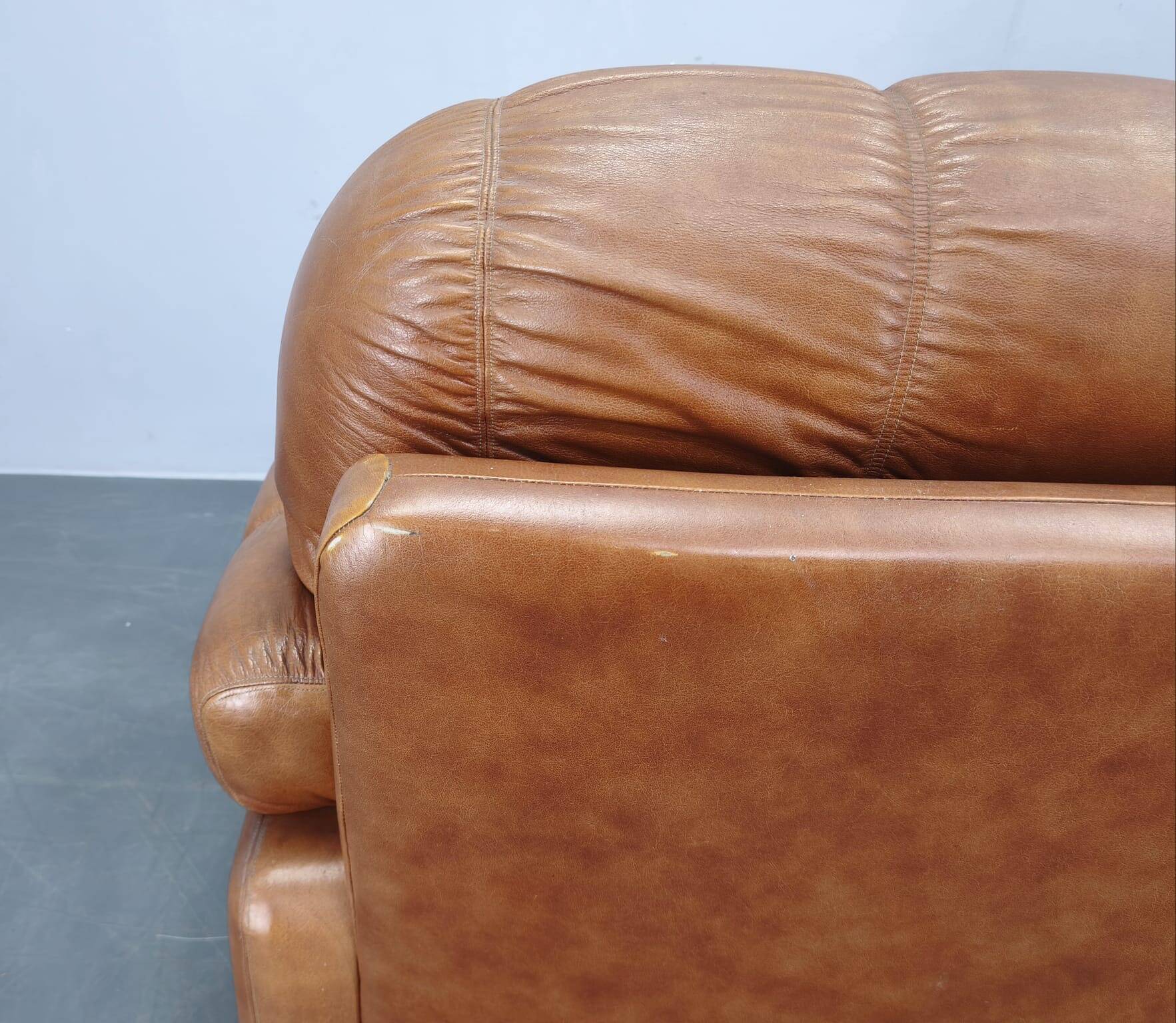 Three-seater sofa from the mid-century produced in Italy in the 1970s.