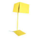 yellow metal lamp in vintage style