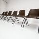 Brown and black set of 6 Polyprop chairs on a metal frame. The Polyprop cha