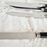 Silver and ebony table knives, stainless steel blade, late 19th century.