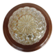 ceiling light with amber glass globe, on a round light wood base