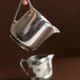Two argent aluminium Art Nouveau sauce boats by Newmaid Picquot Ware, England 1950s - set of 2