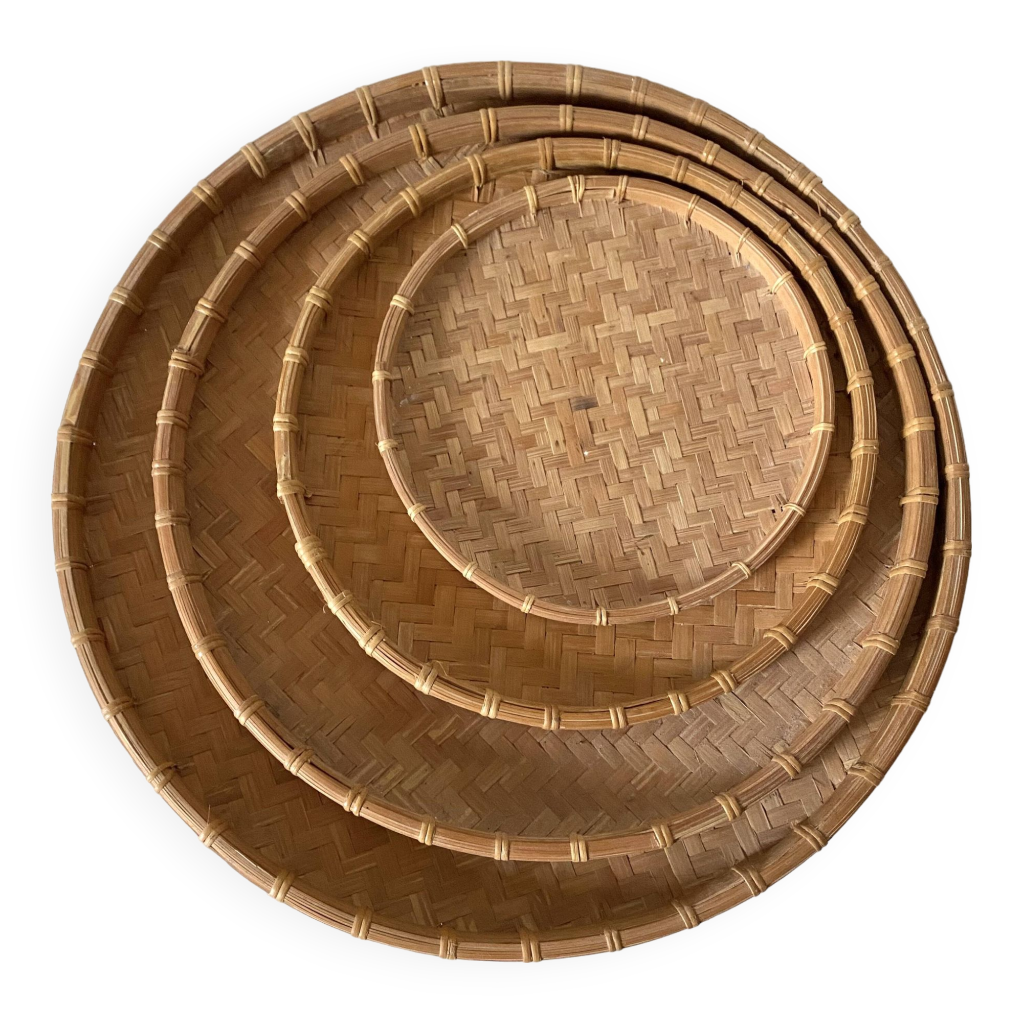 Round nesting trays in woven bamboo