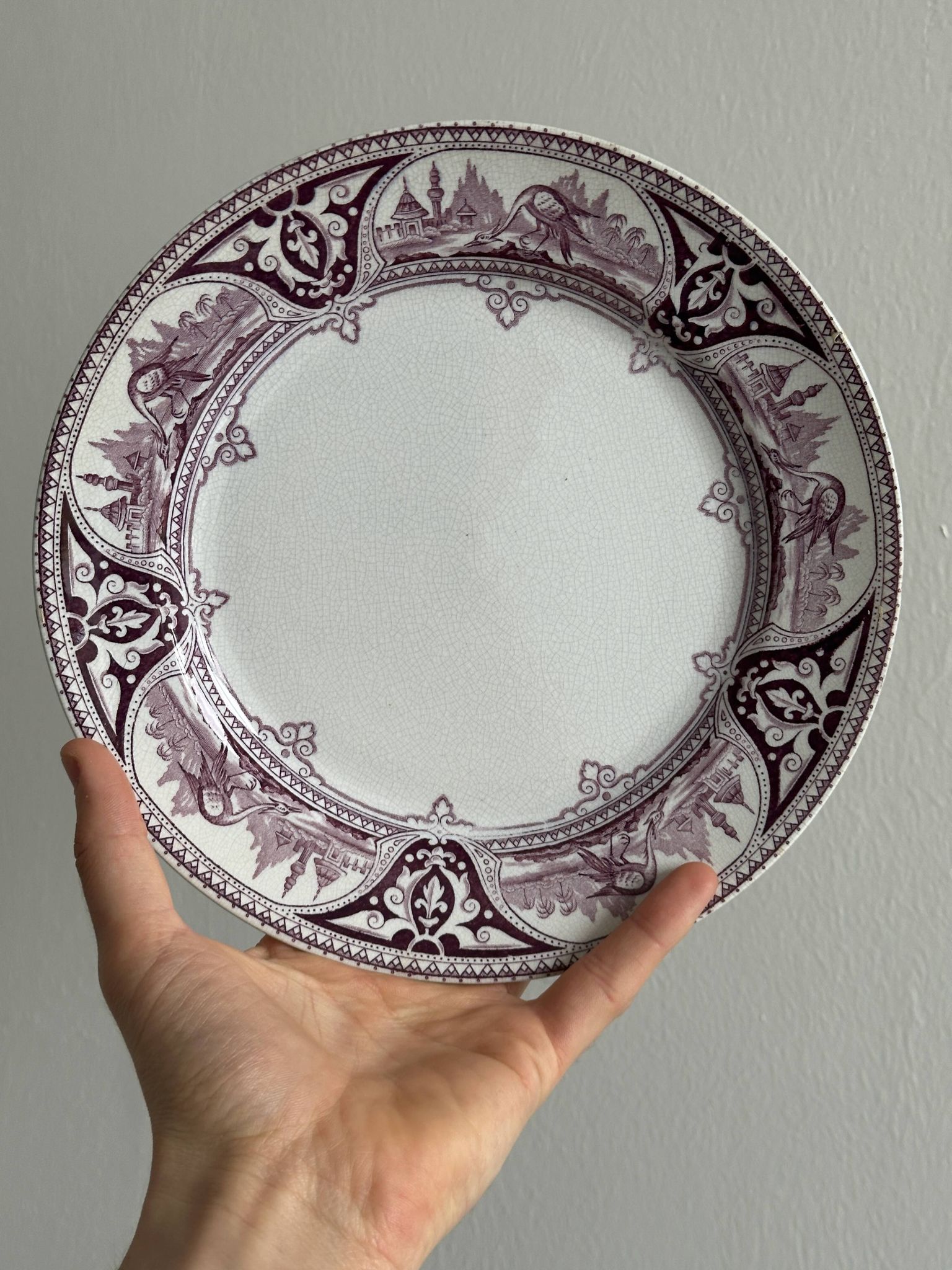 Antique plate with purple oriental decoration
