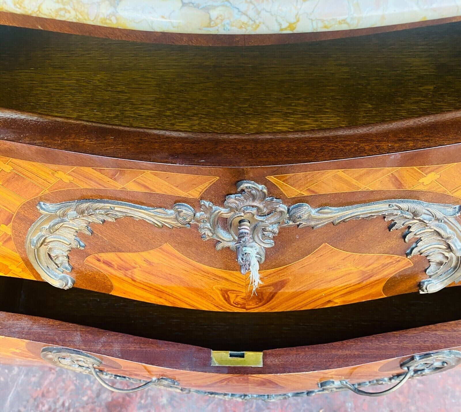 Curved chest of drawers Louis XV style marquetry with cube bottom XX century
