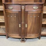 Art Nouveau mahogany buffet with clock in the style of G. Serrurier Bovy.