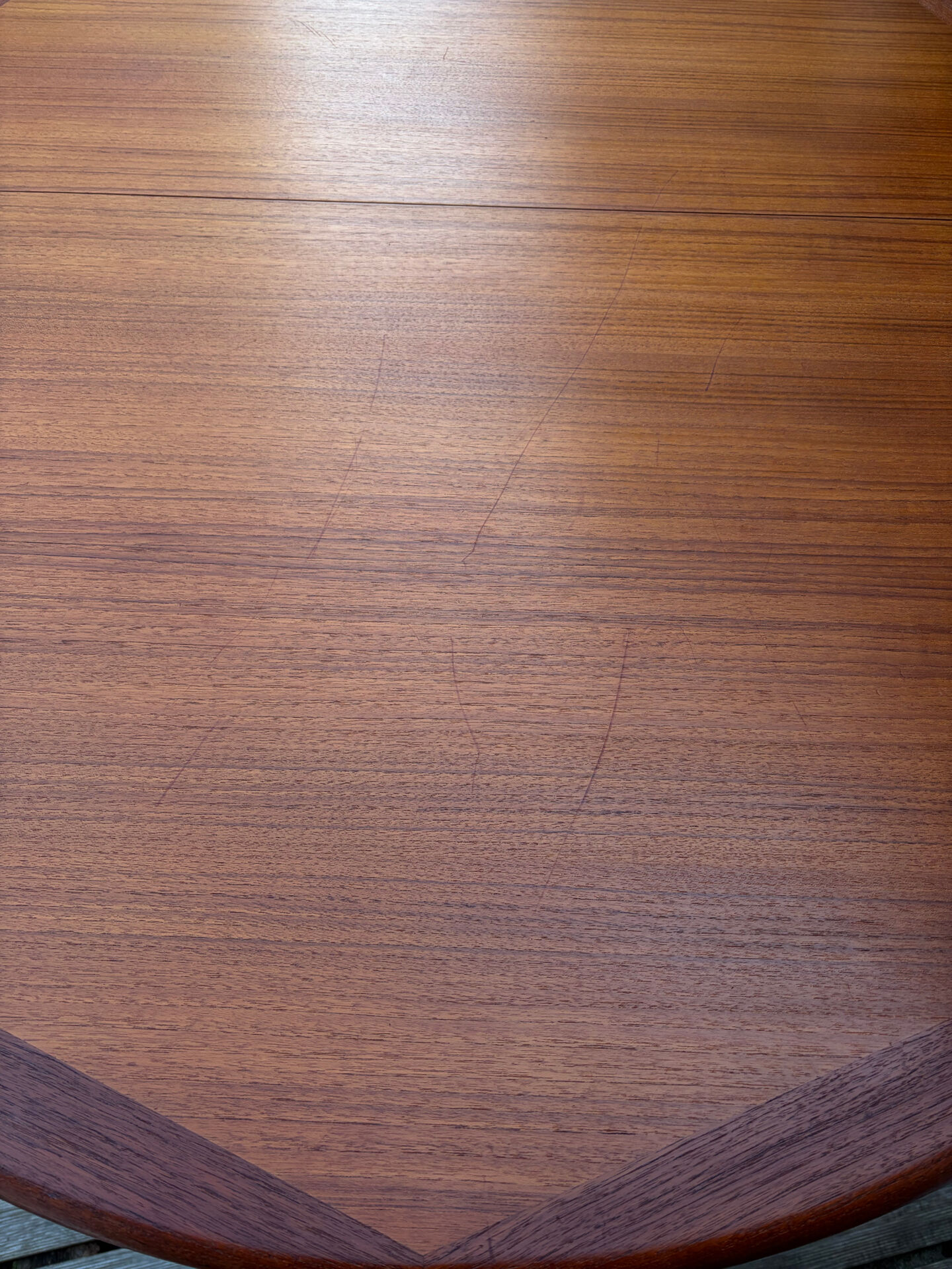 Oval teak table extendable with two leaves, Baumann style.