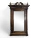 Large Renaissance-style mirror in solid walnut