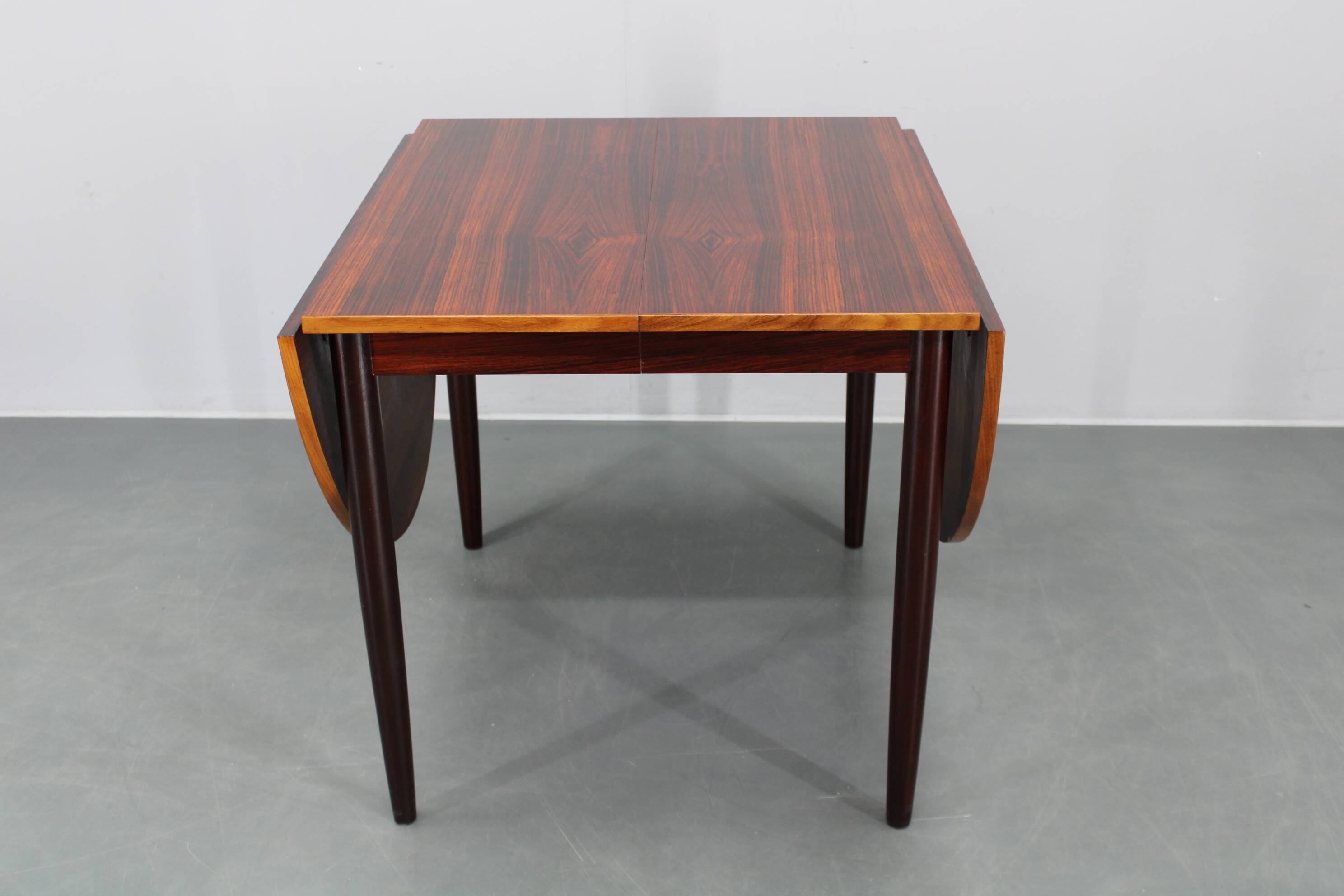 1960s Danish extendable palisander dining table, 4 leaves, restored
