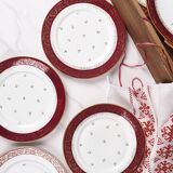 Suite de 10 assiettes à dessert et un plateau en porcelaine de Limoges, ETS Ternet