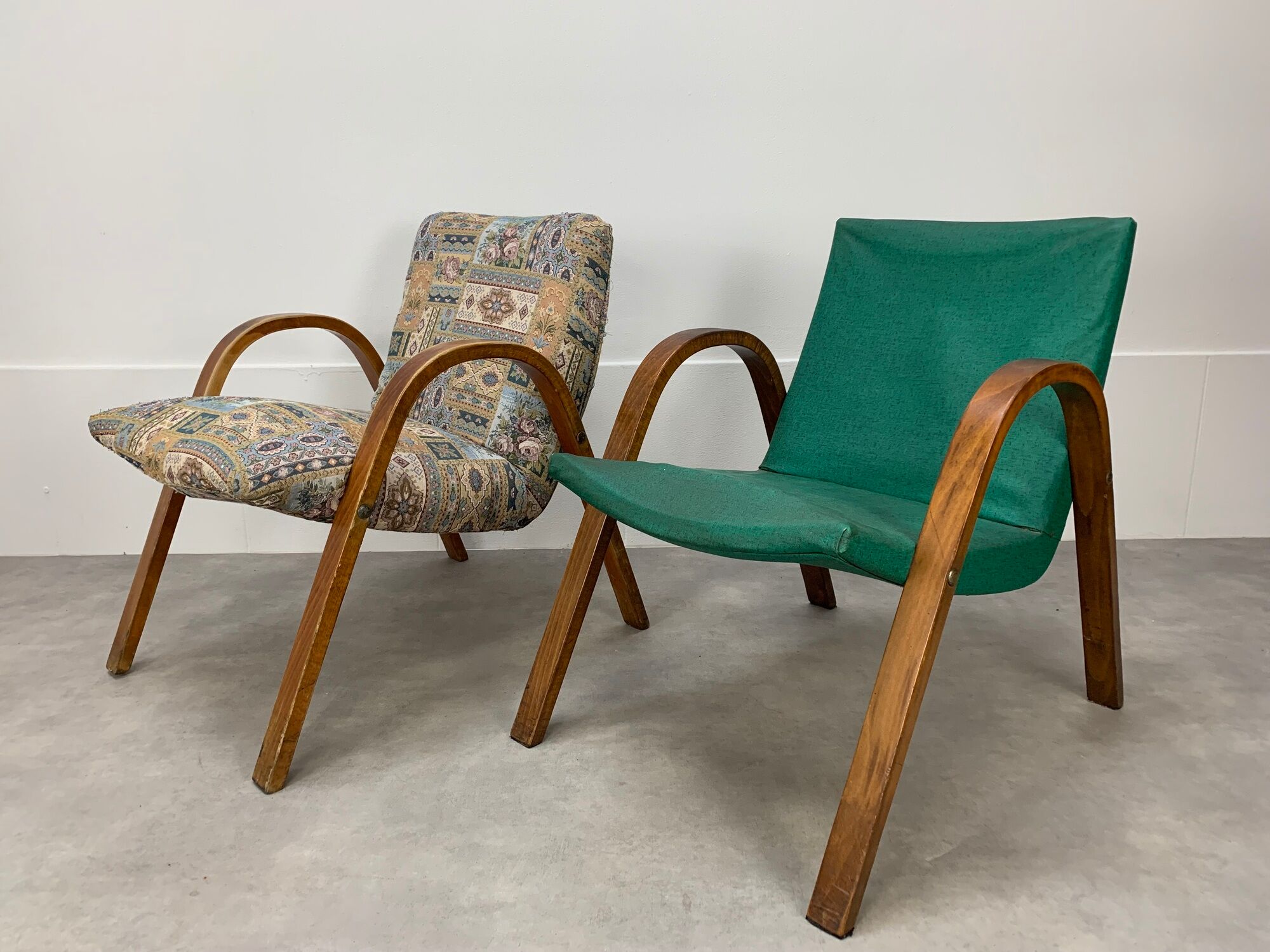 Pair of Bow Wood Hugues Steiner armchairs for Baumann