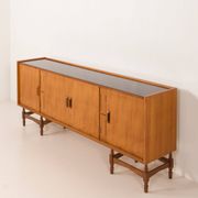 Itaian mid century teak sideboard with black glass top and inlays, 1970s