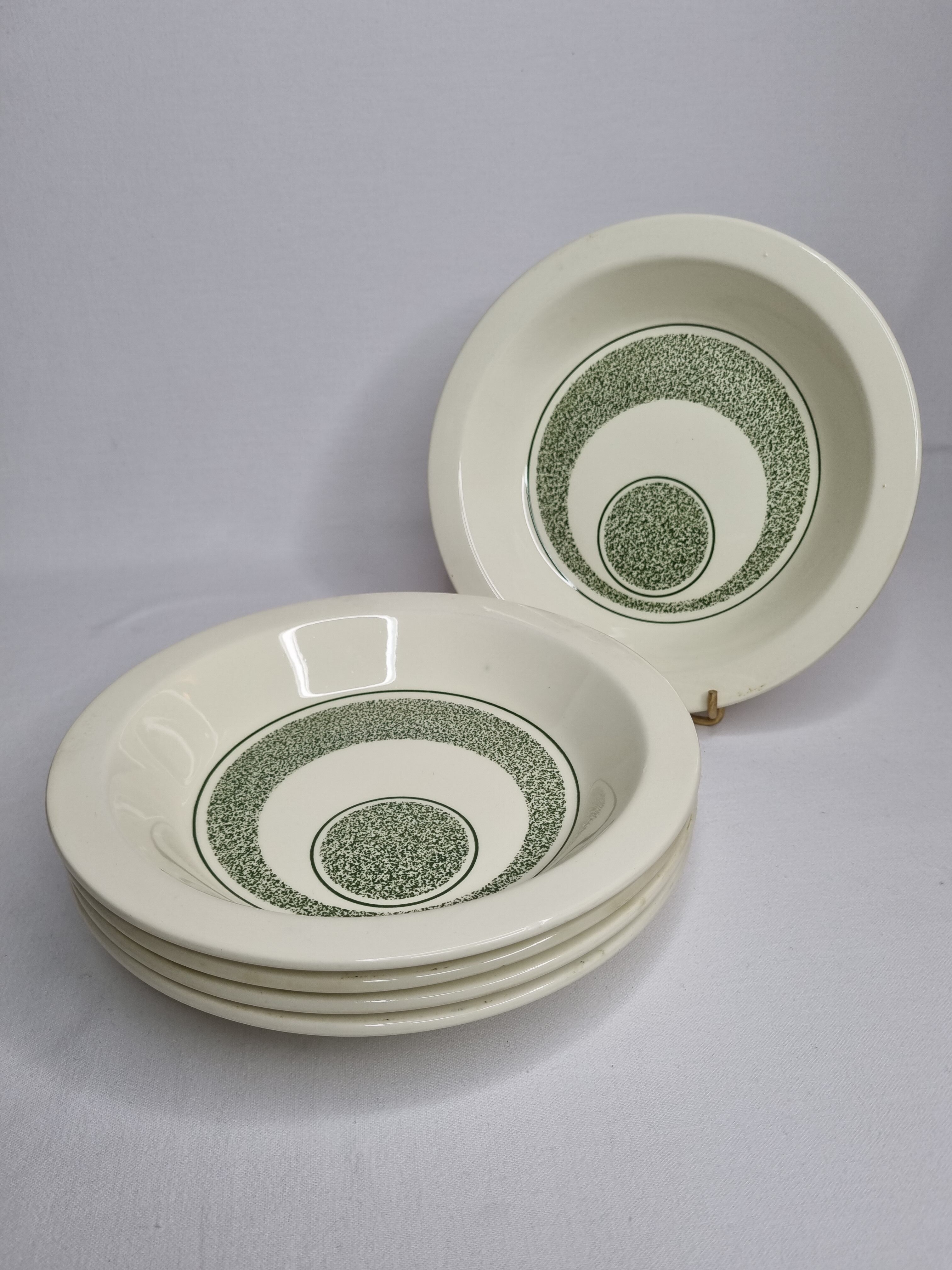 Set of five hollow plates, OpArt, 70s of the faience factory of Gien