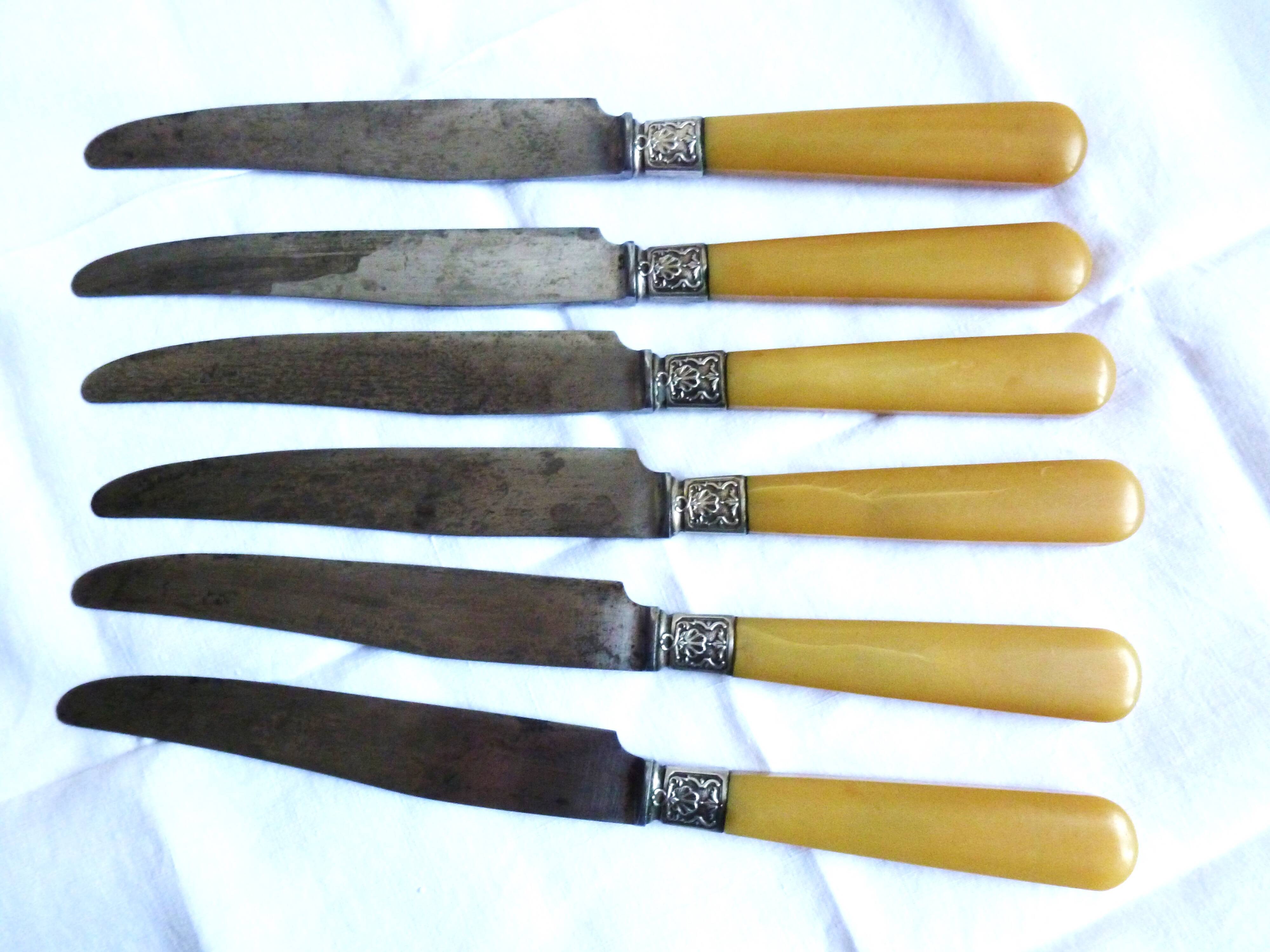 Art Deco cutlery, spoons, forks and table knives.