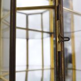 Vintage showcase in brass, glass and mirrors