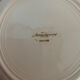 8 white porcelain plates