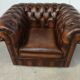 Brown leather chesterfield armchair