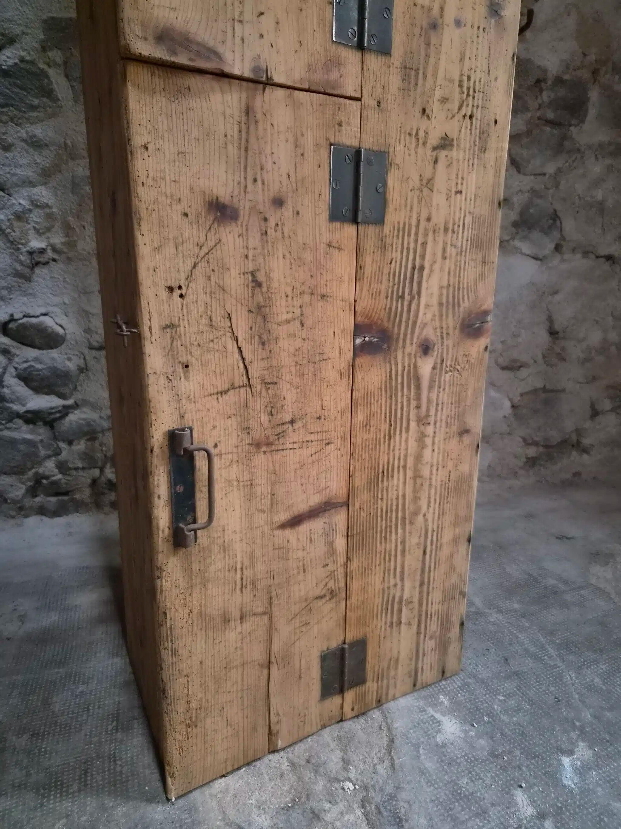 Antique French workshop cabinet in pine with compartments.
