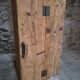Antique French workshop cabinet in pine with compartments.