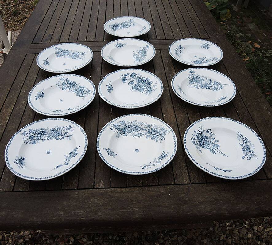 10 old deep plates made of ironstone with floral decoration