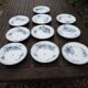 10 old deep plates made of ironstone with floral decoration