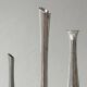Set of three lightweight silver-coloured metal vases.