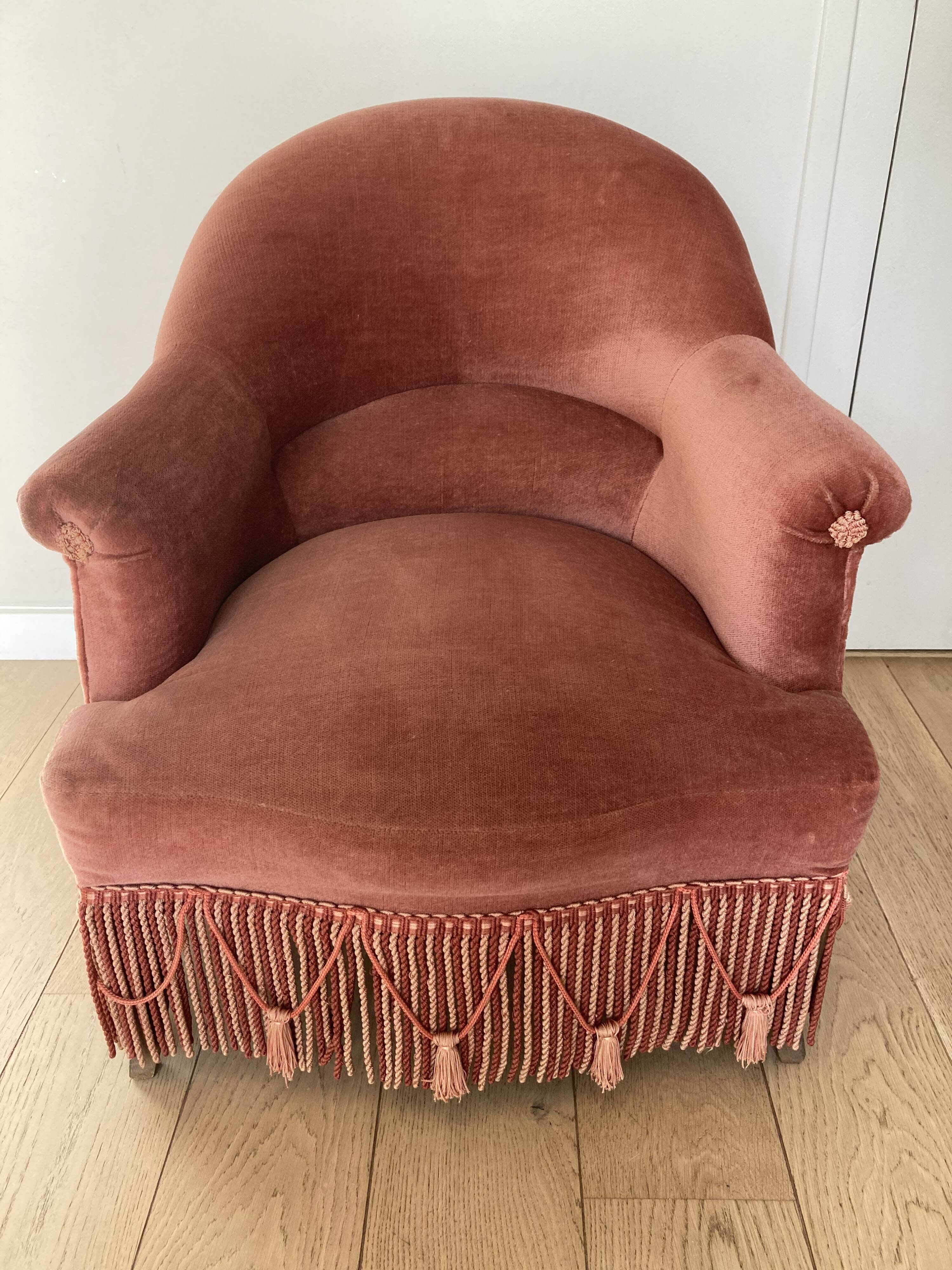 Pink velvet armchair