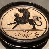 Cup decorated with winged sphinx in Ciboure sandstone signed Marie Fernandez