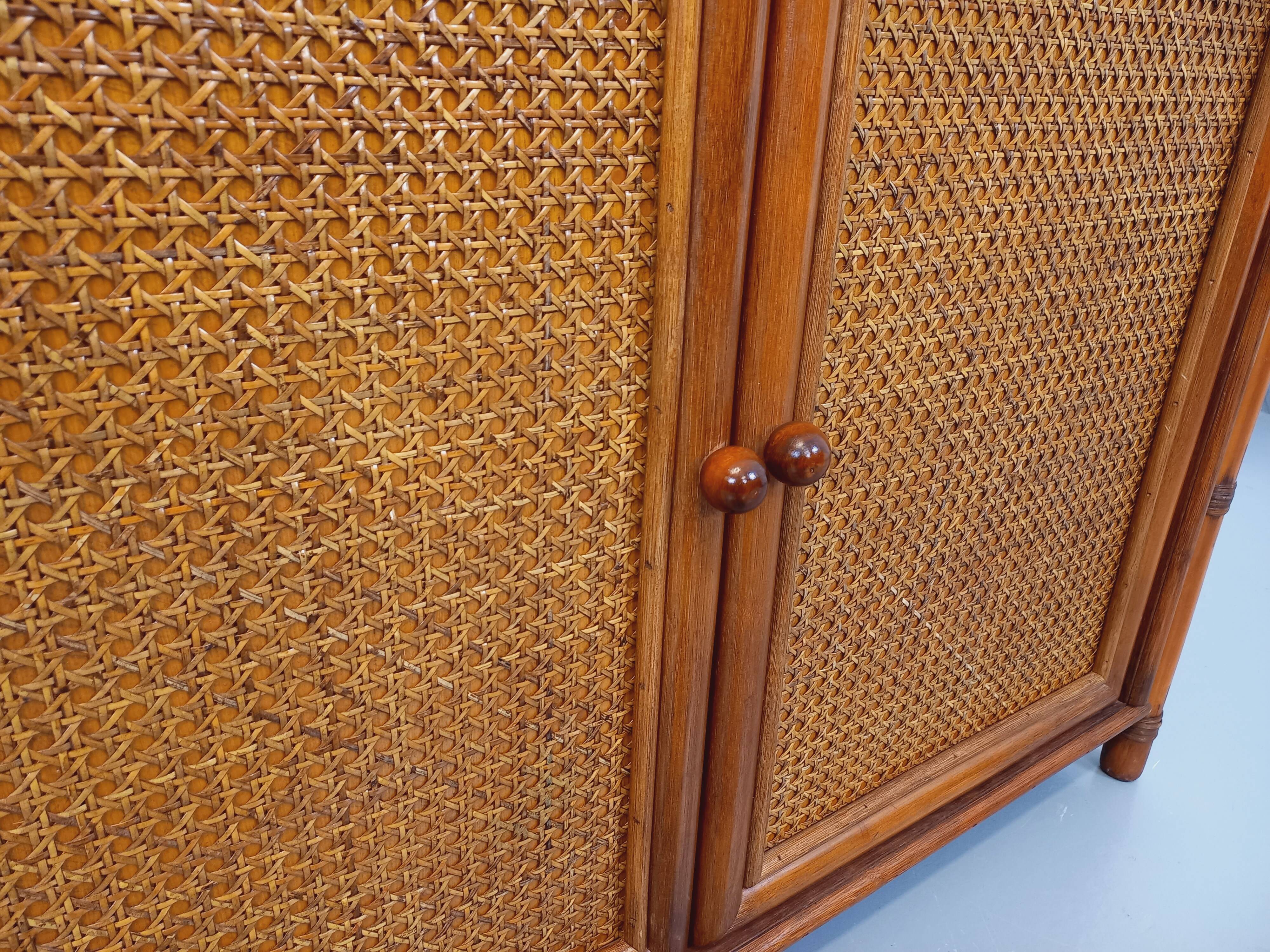 Large vintage rattan, wood and cane bookcase from the 70s