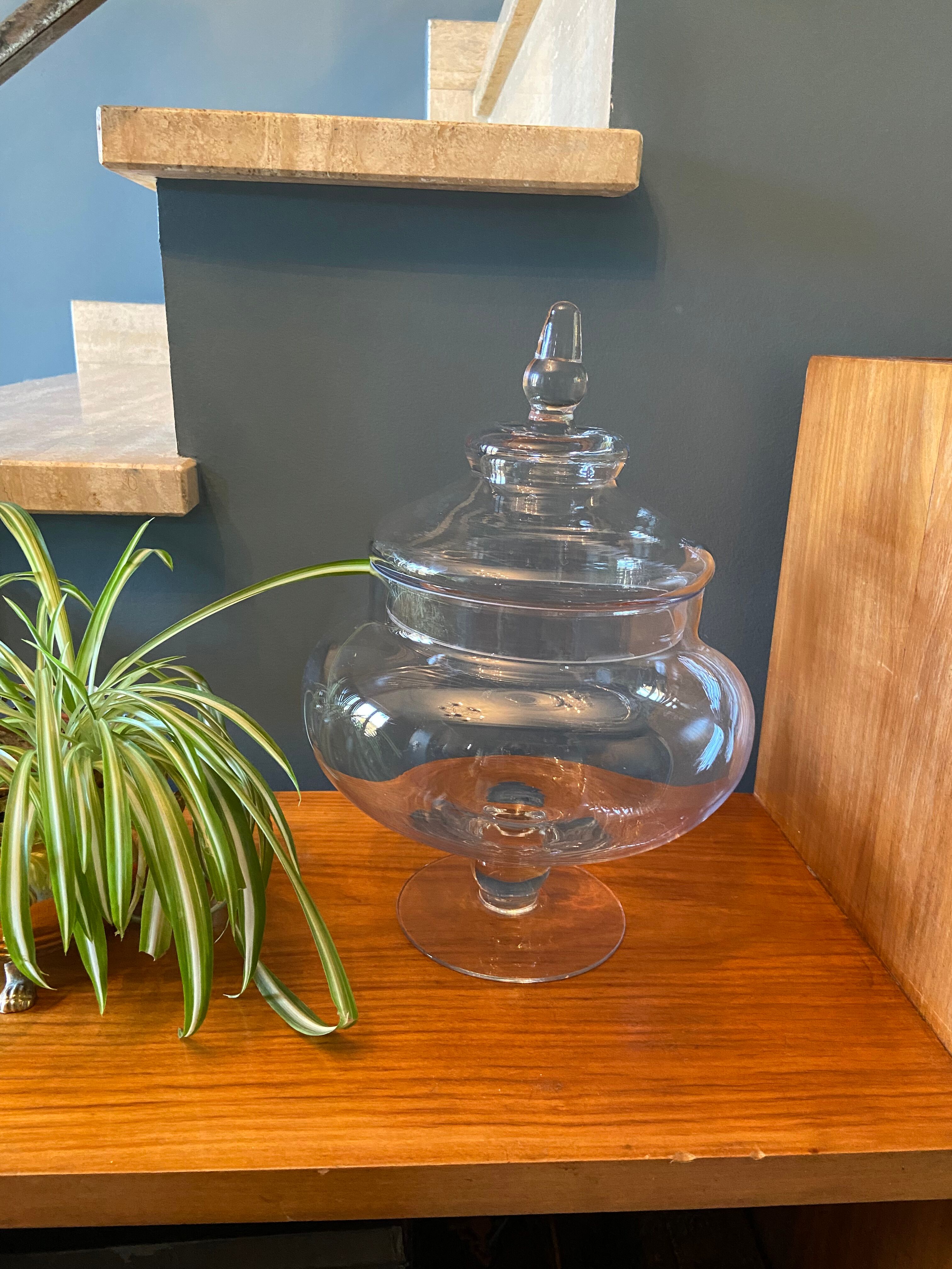 Glass jar on pedestal