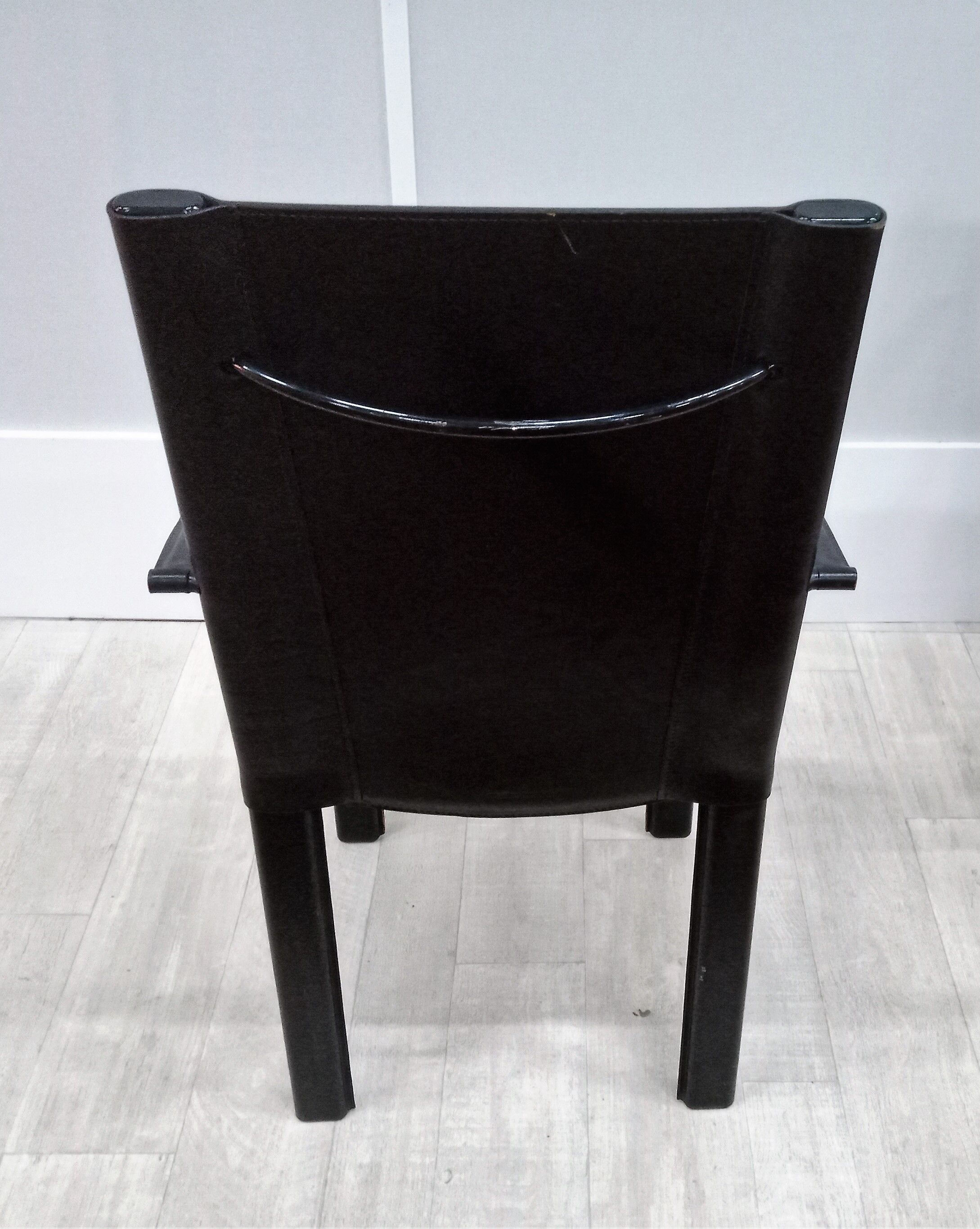 Black leather coral chairs by Matteo Grassi