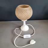 60's table lamp with tulip base and stretched wire shade.