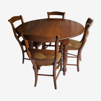 Round table, Louis Philippe style, antique patina, its 2 extensions and 4 chairs