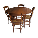 Round table, Louis Philippe style, antique patina, its 2 extensions and 4 chairs