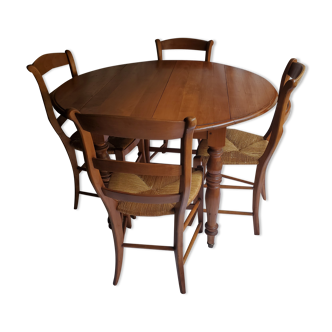 Round table, Louis Philippe style, antique patina, its 2 extensions and 4 chairs