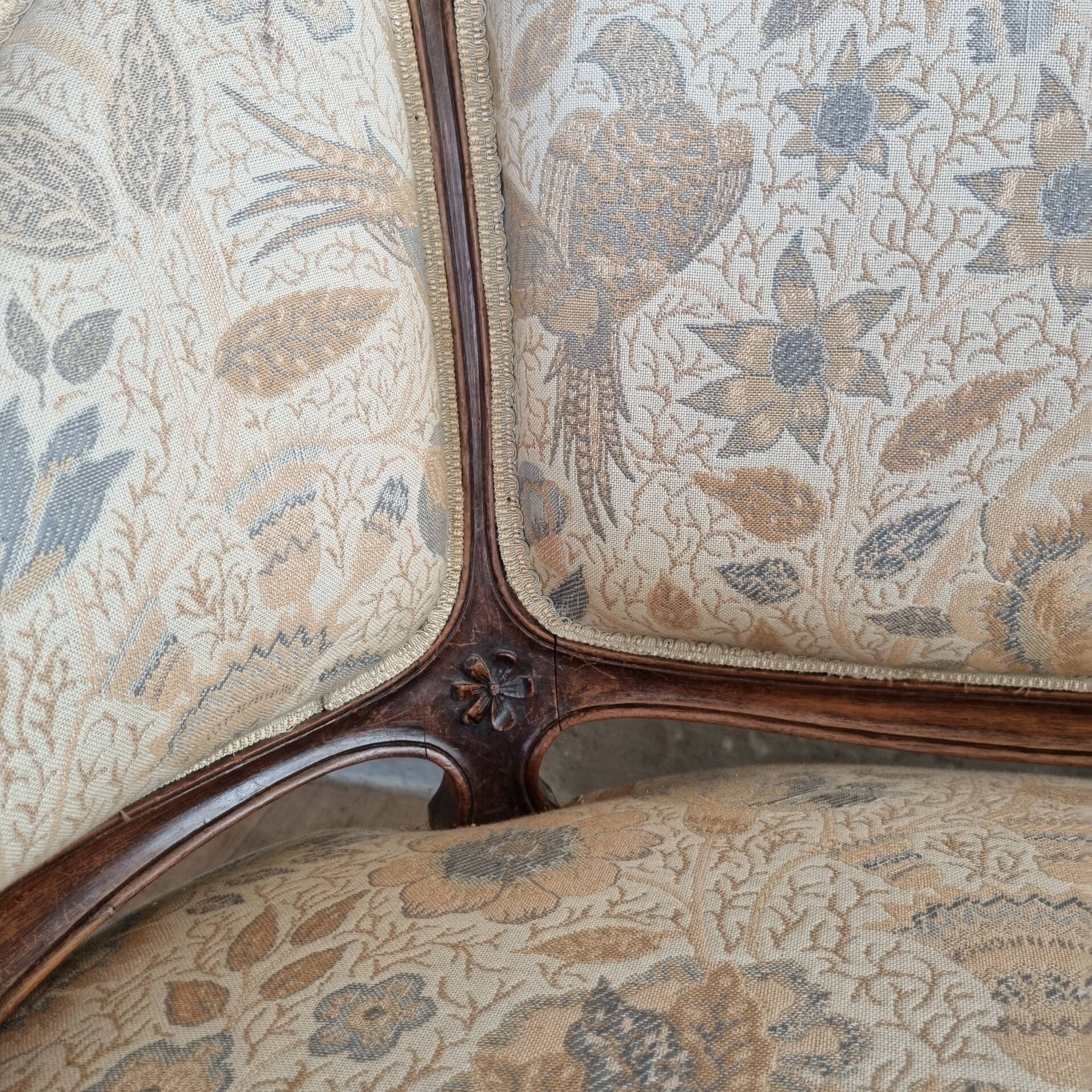 Small sofa or bench in Louis XV style, rococo.