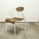 Atypical chair of the 70s metal and wood